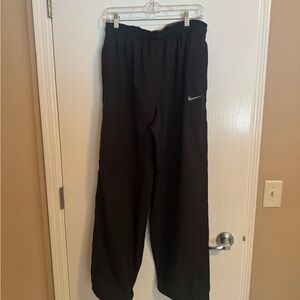 Nike Kids Black Joggers with White Swoosh